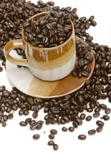 Coffee beans in coffee cup