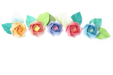 5 origami roses decoration on a white background