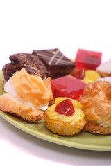 many sweet deserts on the white background