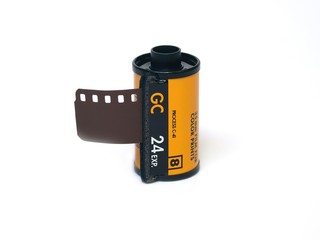 Film cassette on white background