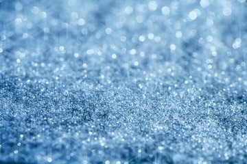 blue glitter sparkles background with star light