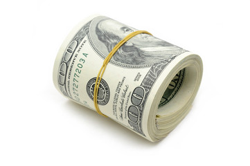 Roll of US money in isolated white background