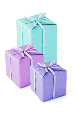 Colorful Gift boxes with bow ribbons on white