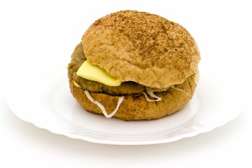 Sandwich on a white plate on a white background