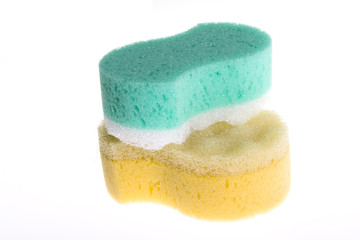 Two sponges isolated on white background