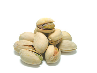 salted pistachios isolated on white background