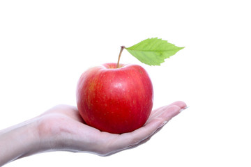 An apple on the hand isolated on white