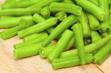 Fototapeta premium string beans on the wooden board