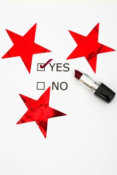words yes and no with lipstick and red stars, voting