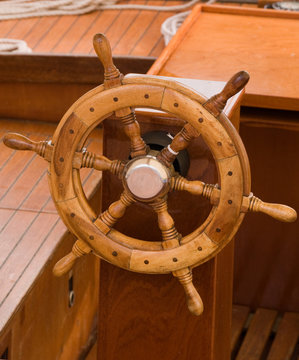steering wheel on an old yach