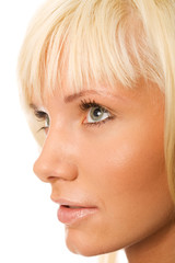 closeup portrait of pretty blond woman on a white background