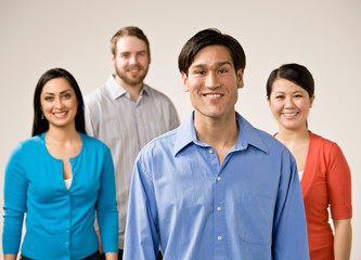 Confident group of  friends smiling and posing