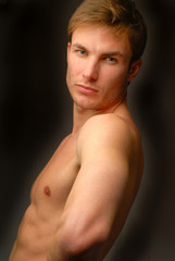 portrait young naked men which looks  the chamber