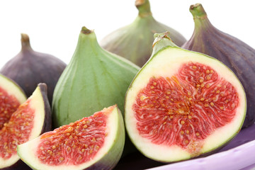 close-ups of fresh figs isolated on white - food and drink