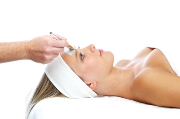 Woman having a beauty facial spa treatment