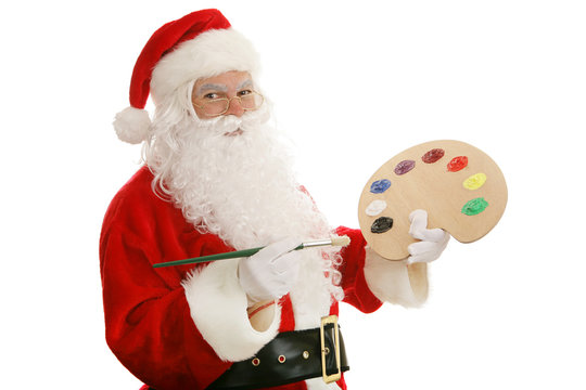 Santa Claus with an artists palette and paint brush.  Isolated