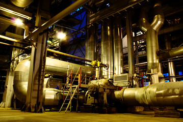 assortment of different size and shaped pipes at a power plant