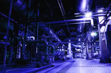 Photo sur Plexiglas Bâtiment industriel assortment of different size and shaped pipes at a power plant