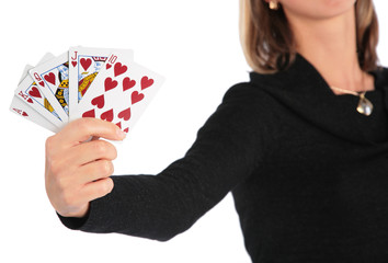 Woman holds   card in hand