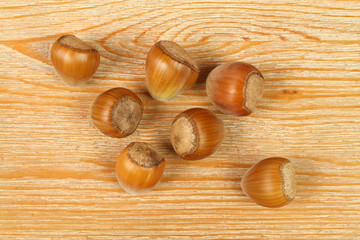 Hazelnuts on a wooden background. Natural food.