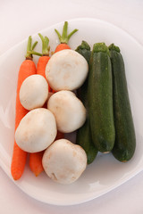 Mixed vegetables top view on white background