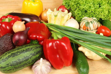 Colorful vegetables on a wooden table