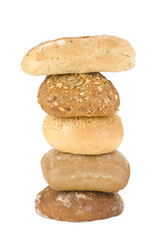 assortment of baked buns on white background