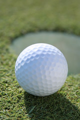 Golf Ball at Cup