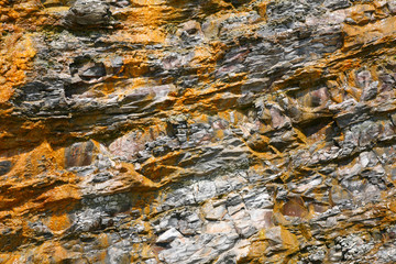 Yellow - grey rock background