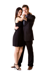 a couple in black dancing and feeling very happy