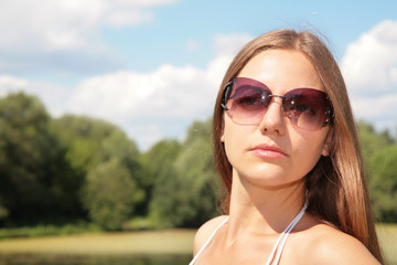 beauty young woman in sunglasses