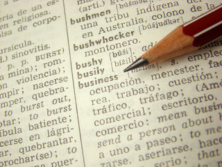 'business' word in english-spanish dictionary with pencil