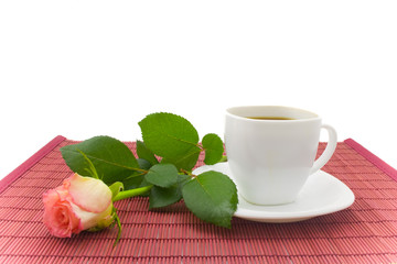Cup of coffee and rose
