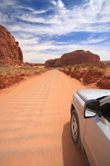 Fototapeta na wymiar 4x4 on road in Monument Valley