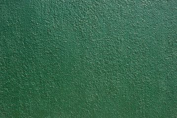 Green colored wall in close up