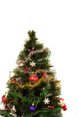 Decorated Christmas tree against a white background