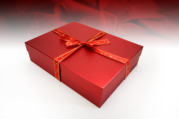 Christmas present with red silk background