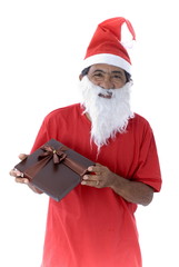 Afro-American Santa Claus Holding a gift on white .
