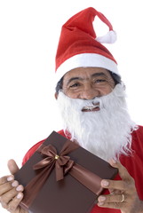 Afro-American Santa Claus Holding a gift on white .