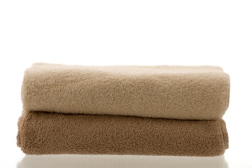 Fototapeta na wymiar Two folded towels on white