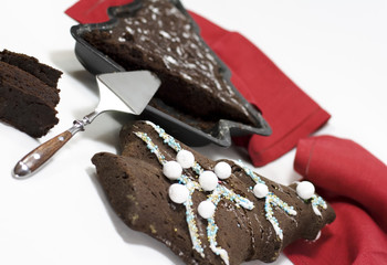 christmas cake with decorations and red napkin