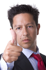 businessman looking powerful and pointing to you