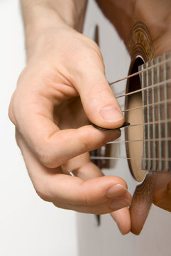 Picking the guitar