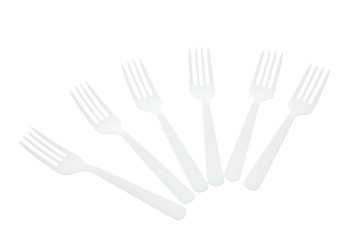 Fototapeta na wymiar Arrangement of Plastic Forks on White Background