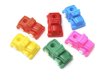 Collection of Plastic Toy Cars on White Background