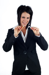 Business woman breaking a cigarette