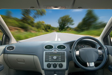 View of a mountain road from a vehicle interior