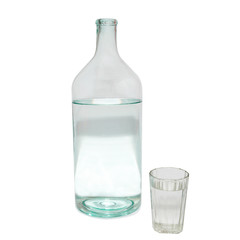 Transparent bottle and glass isolated on white.