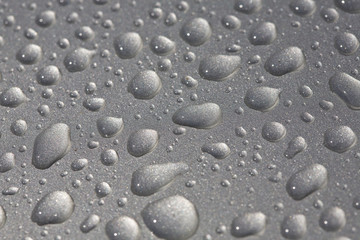 rain drops on metallic surface