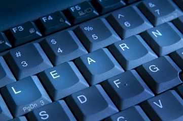 clos up view of keys on keyboard spelling the word learn